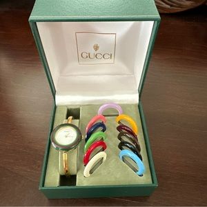 Gucci change bezel 12 colors white/gold dial women’s Watch with box
